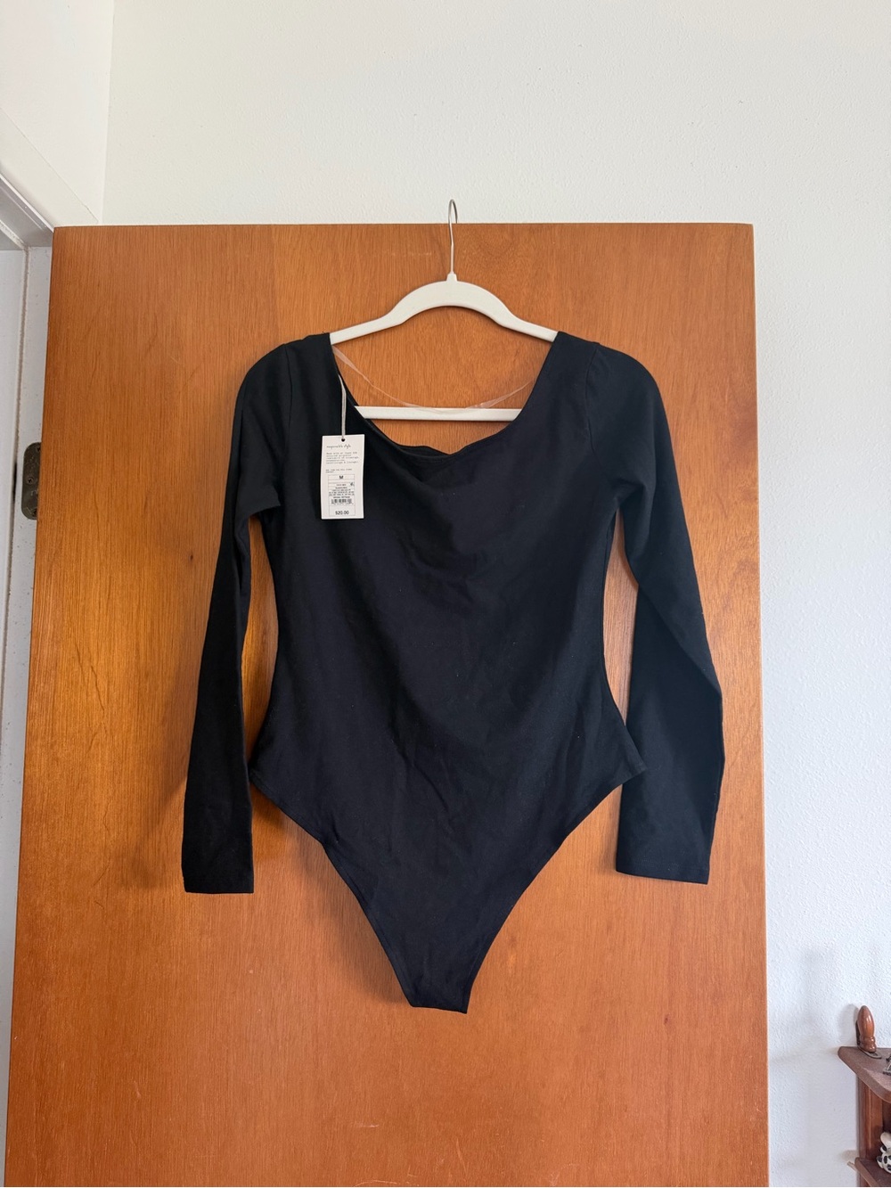 Women's long sleeve black bodysuit